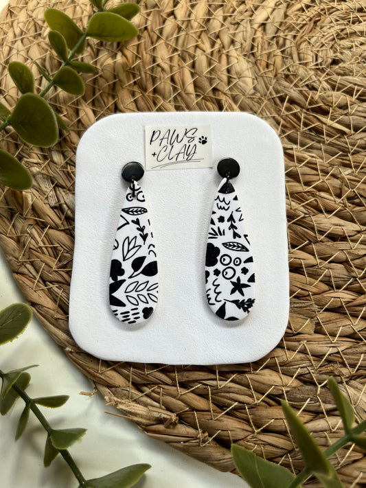 Black and white patterned tear drop shaped polymer clay earrings